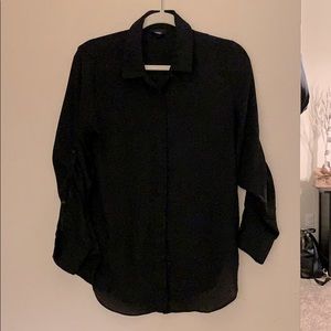 Black button up blouse.